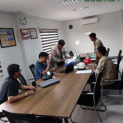 Adamah team in project planning meeting